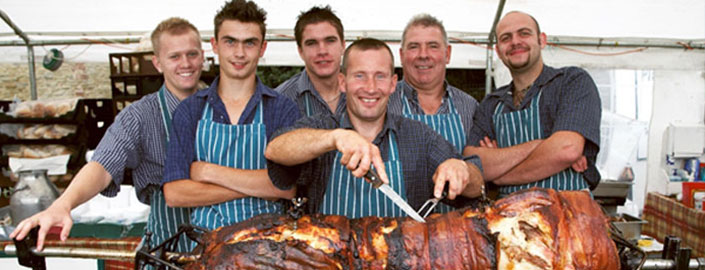 Men-carving-up-a-pig1