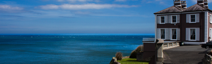 An inviting house stood atop the clifftop in Howth.