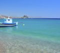 Fishing Boat in Turquoise Ocean