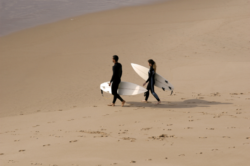 Surfers on a beach