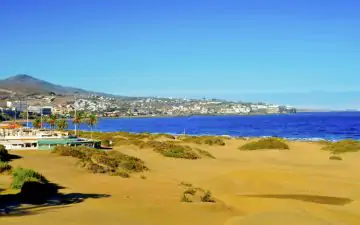 Playa del Ingles on a glorious day, with golden sand and deep blue sea