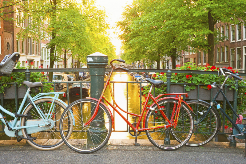 Bikes on bridge over canal, Amsterdam