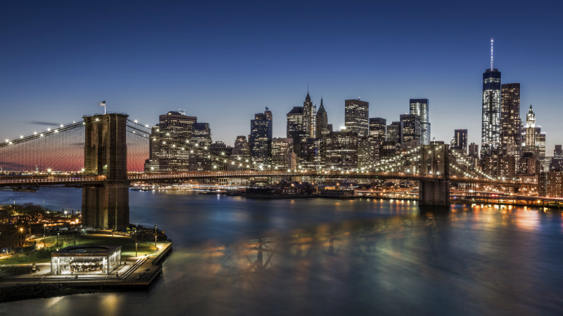 A night time view of Brooklyn Bridge and Downton Manhattan