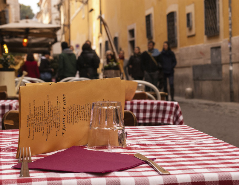 Close up of a table at an outdoor Italian restaurant