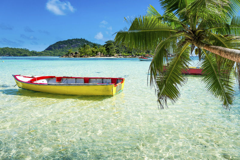 Boat docked near a beach in The Seychelles