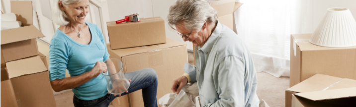Mature couple pack their home