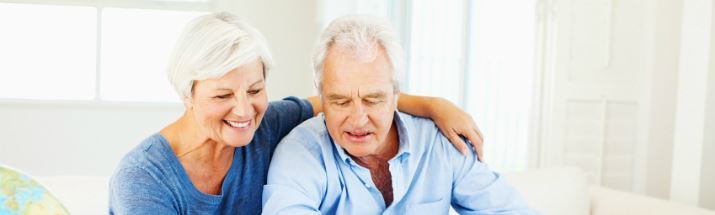 Mature couple looking at retirement spots