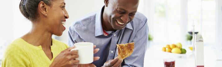 Mature couple enjoying breakfast together