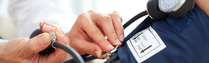 Person having their blood pressure taken
