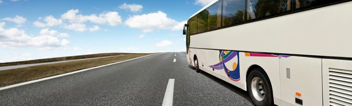 Close up of coach driving down a motorway
