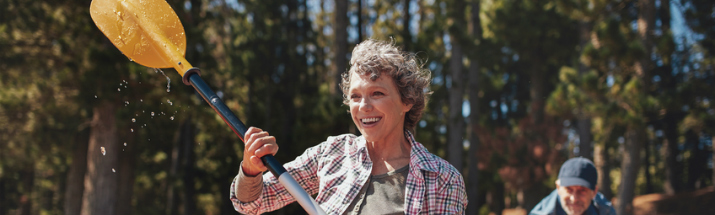Mature woman kayaking on a lake