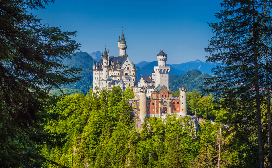 Famous Neuschwanstein Castle with scenic mountain landscape