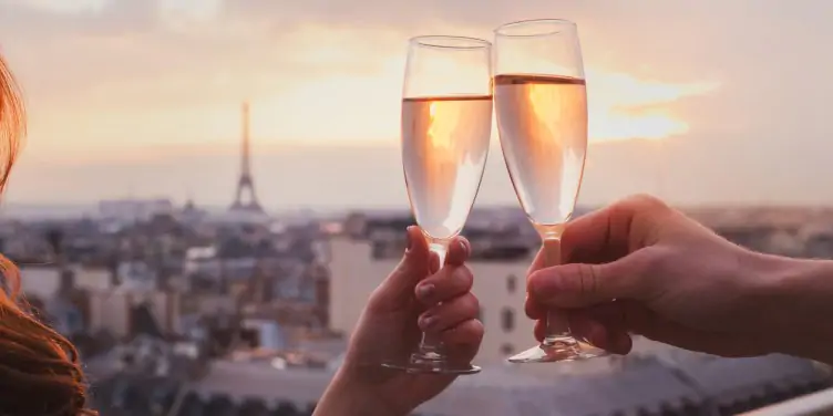 Couple drinking champagne or wine in Paris luxurious restaurant