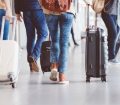 travellers walking through the airport