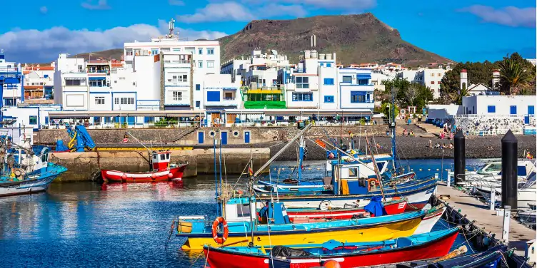Overlooking Puerto de las Nieves harbour with colourful fishing boats