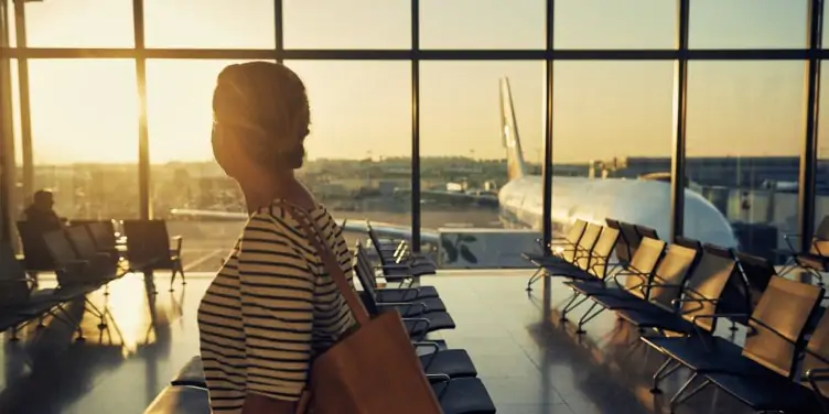 Passenger in departure lounge in airport