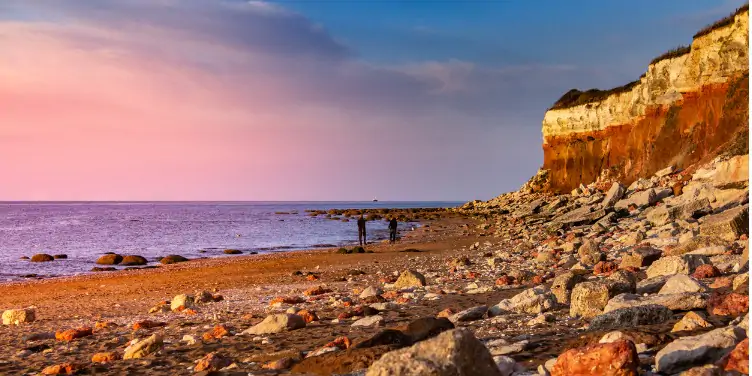 Red cliffs of old Hunstanton beach at sunset