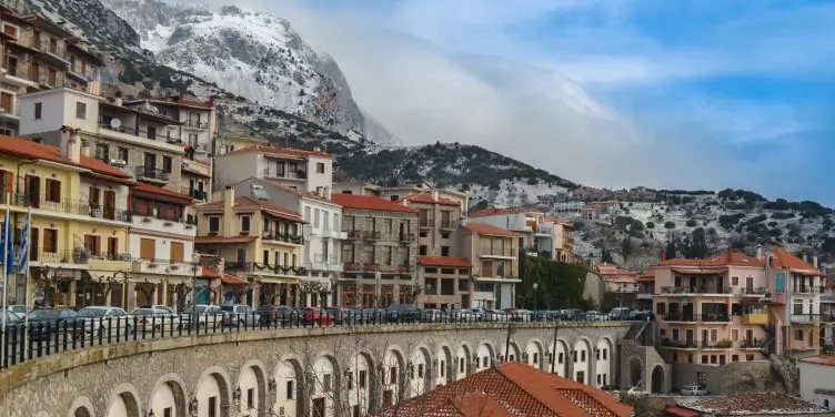 Scenic view of the village of Arachova located on the snowy hills of Parnassus.