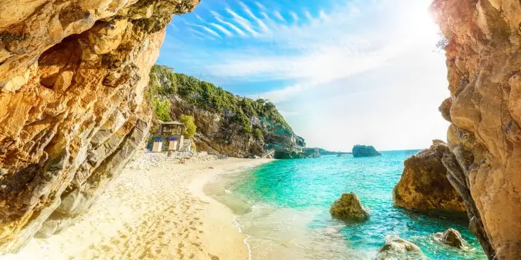 Arched rock formation on a sea beach in Corfu island, Pelion, Greece