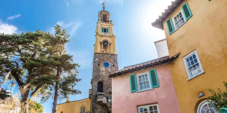 Coloured buildings and clocktower at Portmeirion, North Wales