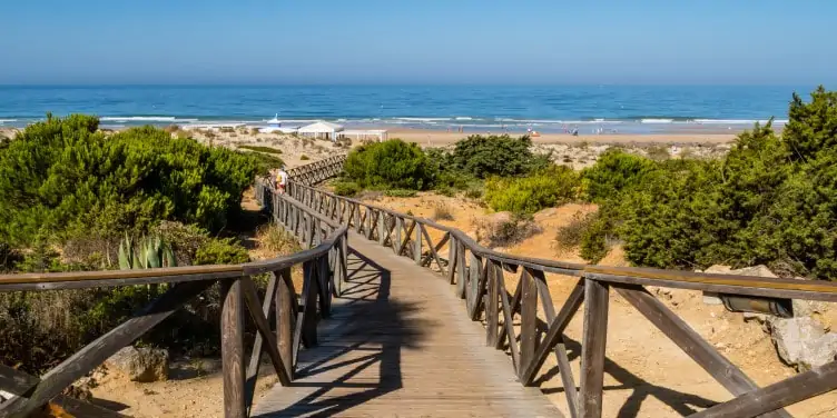 Wooden walkway to the sandy La Barrosa beach