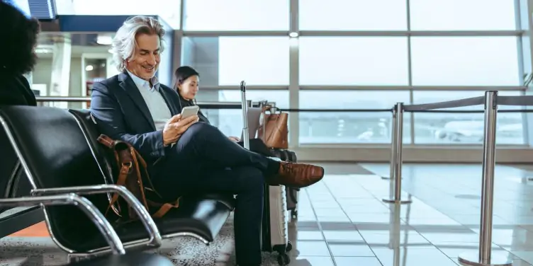 man sitting in airport