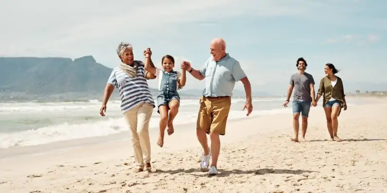 Family having fun on the beach