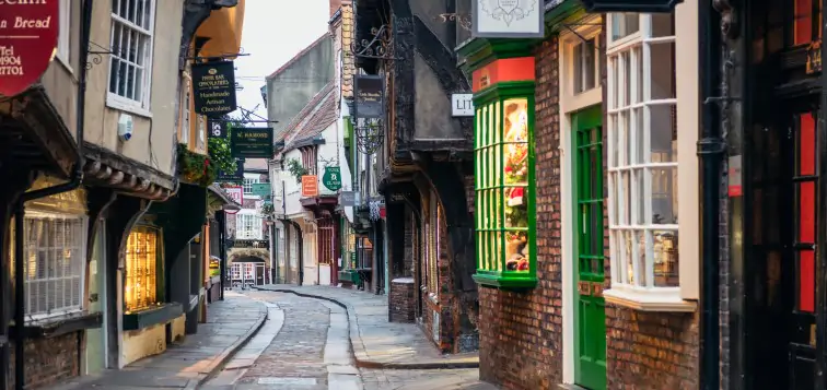 Lights begin to come on in the shops on the highstreet, the Shambles York