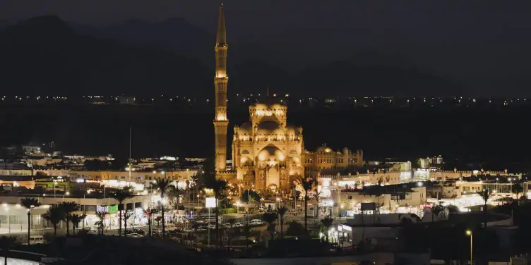 A view of the old town of Sharm El Sheikh at night with a close up view of a traditional Egyptian mosque.