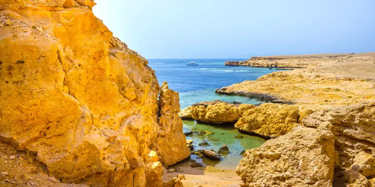 A view across a cove with blue water at Ras Muhammed National Park.